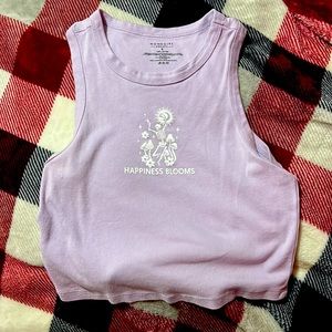 I am selling a light purple cropped tank top the brand is home girl society.